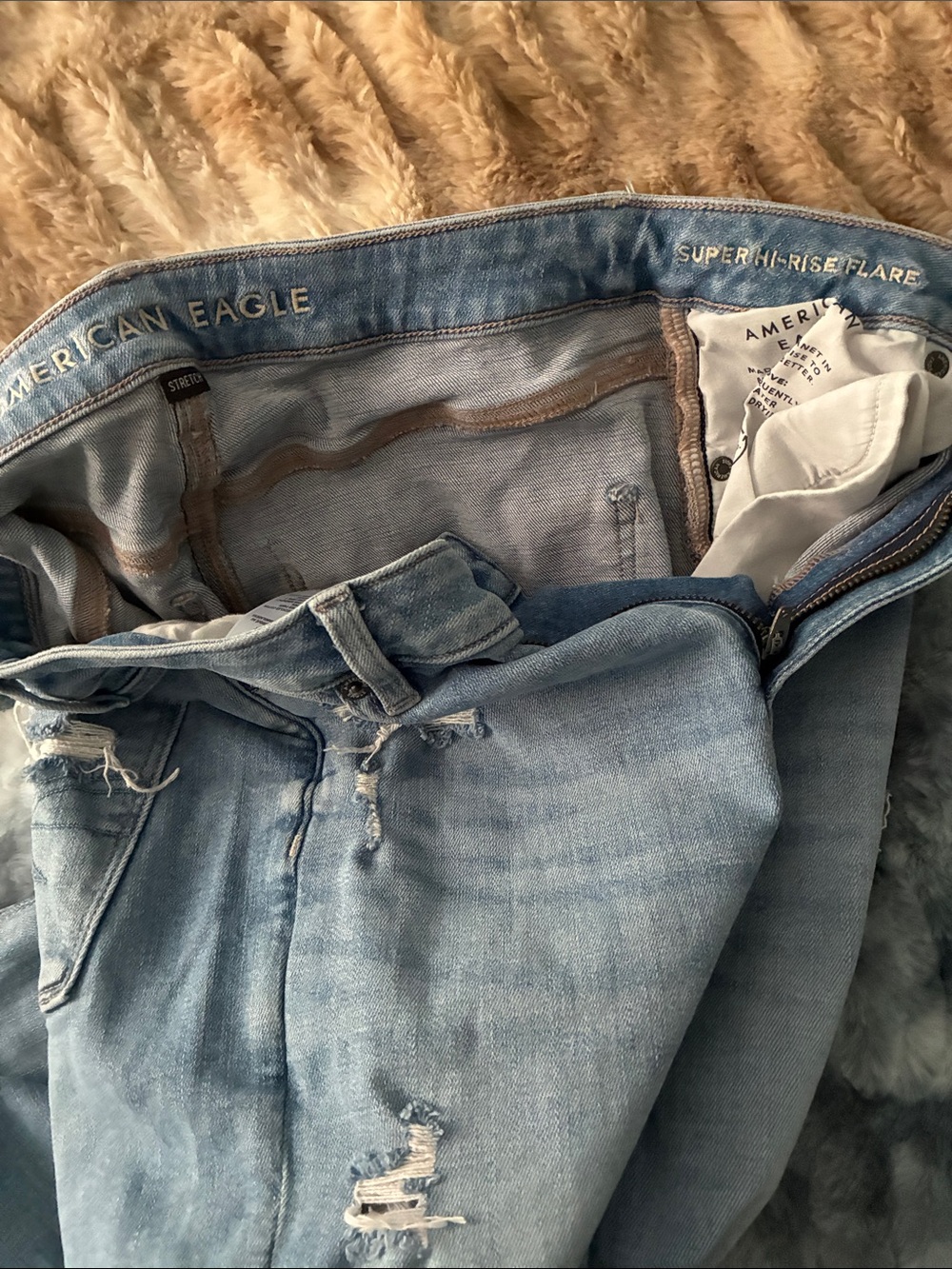 AE Light Wash Distressed Flare Jeans - Women - Picture 11 of 12